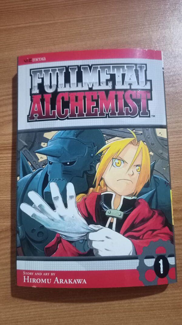 Fullmetal Alchemist, Vol. 1: Volume 1 Paperback 2009 by Hiromu Arakawa (Author) - Image 2